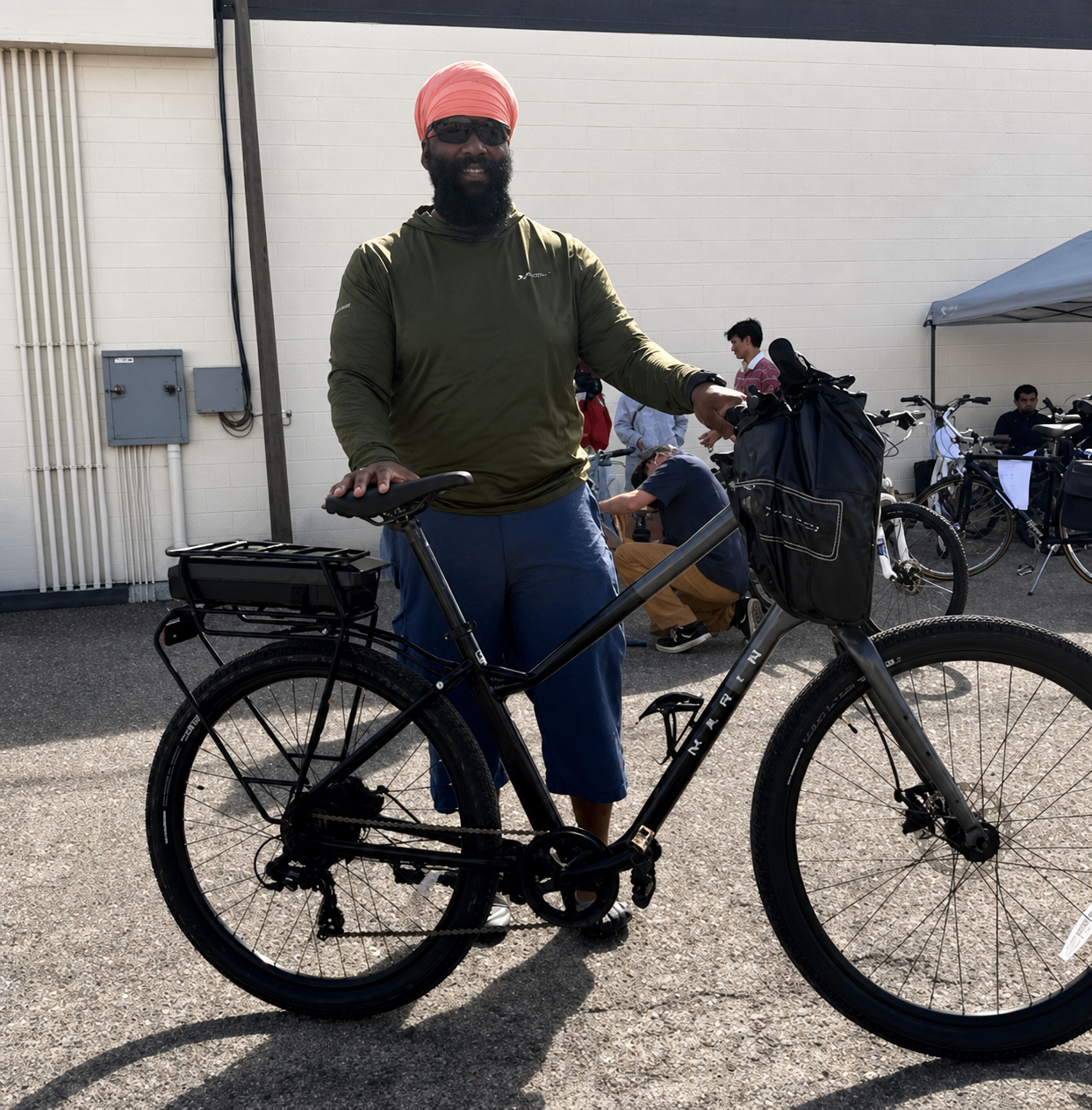 Person with an e-bike at YYC Bike Swap